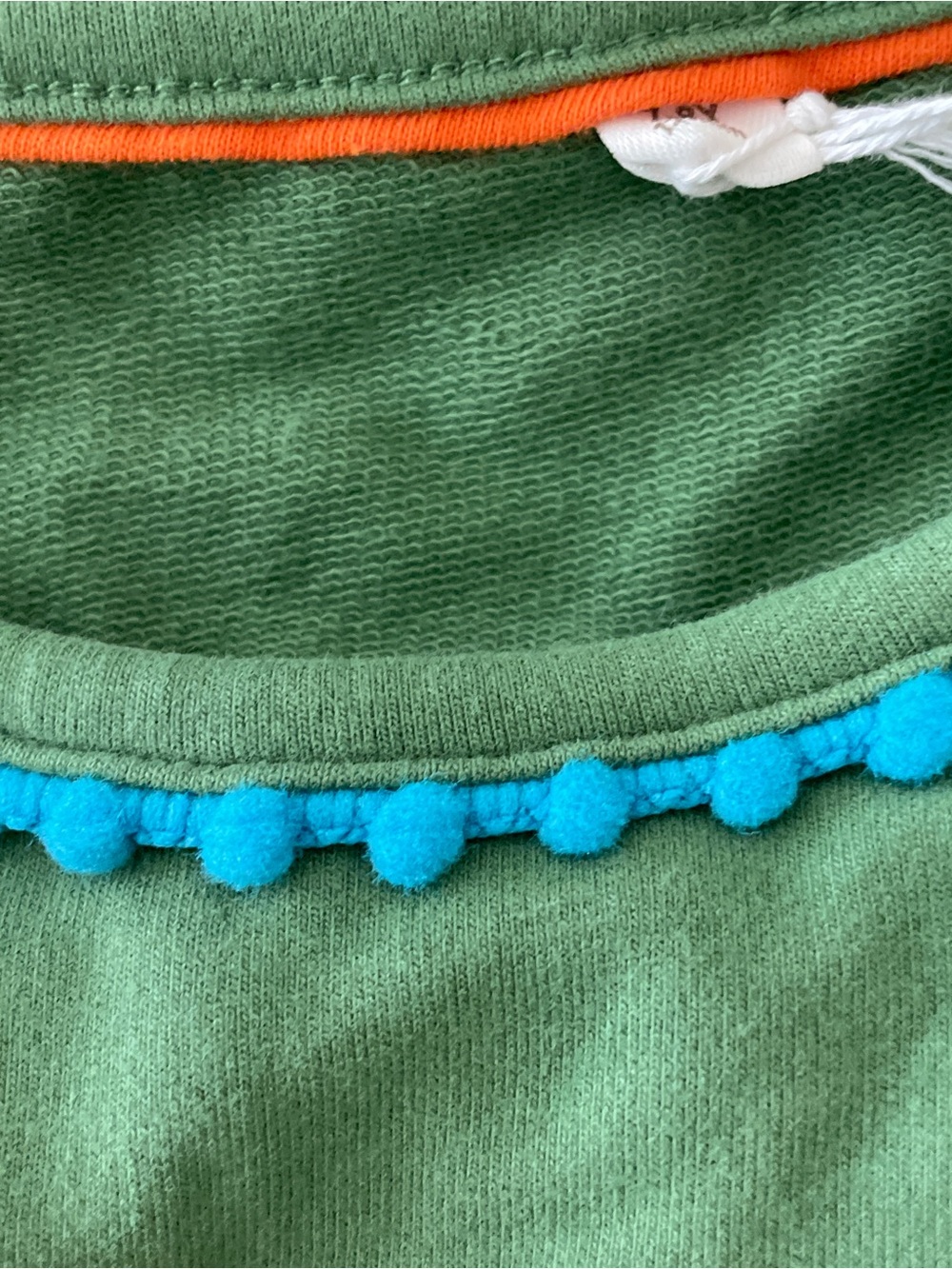 Mini Boden green sleeveless alligator pom-pom romper Size 7-8